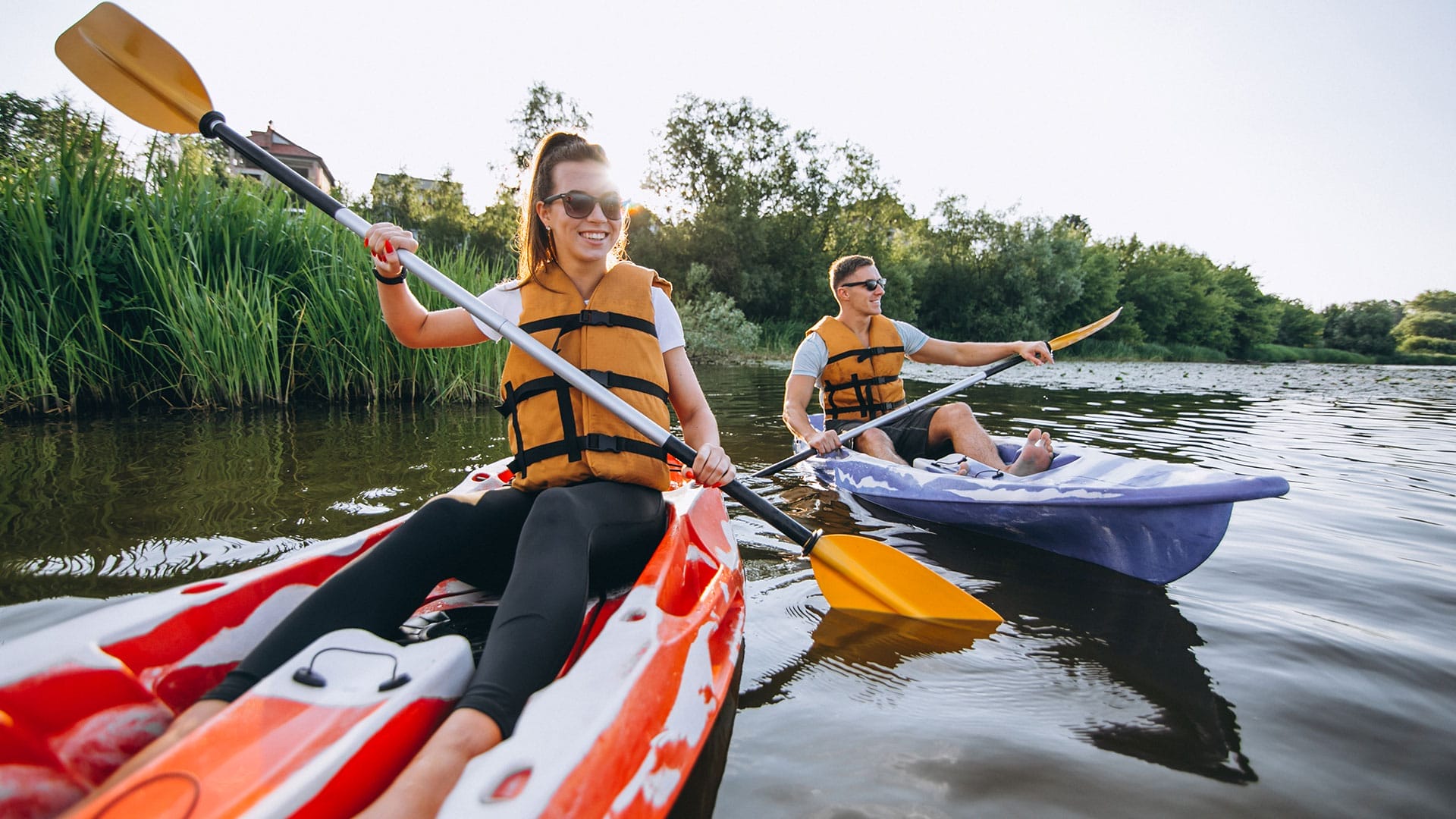 Tandem kayak rental experience in Flat Rock, MI on the Lower Huron River for couples looking for romantic outdoor date ideas.